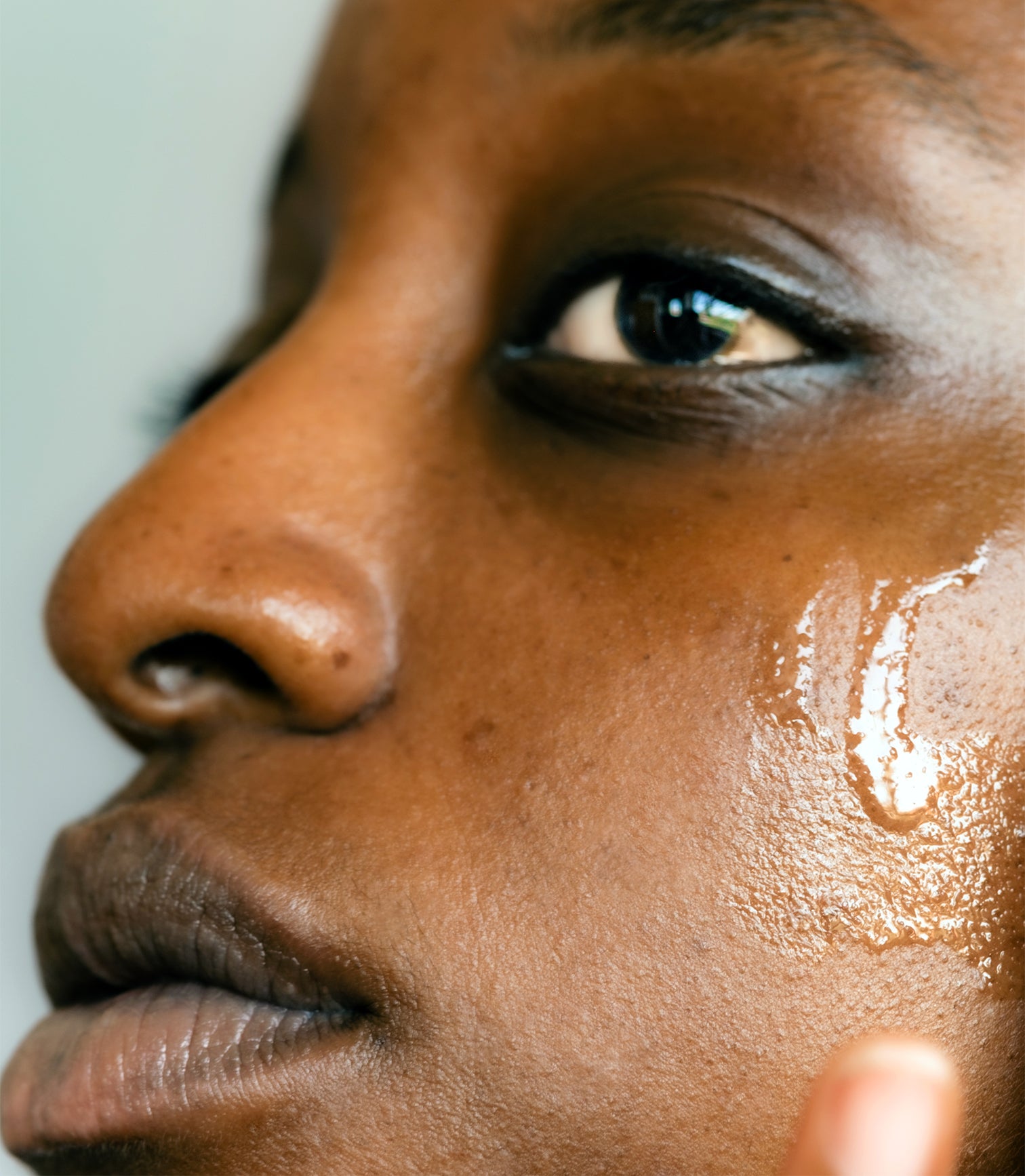 Close-up of a person's face with a focus on the skin texture.
